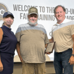 Pictured, from left: Holly Montooth, Public Transportation Director; Donny Miller, Driver; and Mark Farley, Executive Director.
