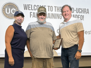 Pictured, from left: Holly Montooth, Public Transportation Director; Donny Miller, Driver; and Mark Farley, Executive Director.