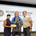Pictured, from left: Holly Montooth, Public Transportation Director; Michael Smith, Driver; and Mark Farley, UCHRA Executive Director.